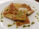 Ravioli with ricotta and spinach in ragu sauce