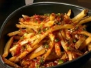 Crispy french fries with celery and chilli 