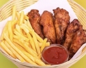 French fries with crispy chicken wings